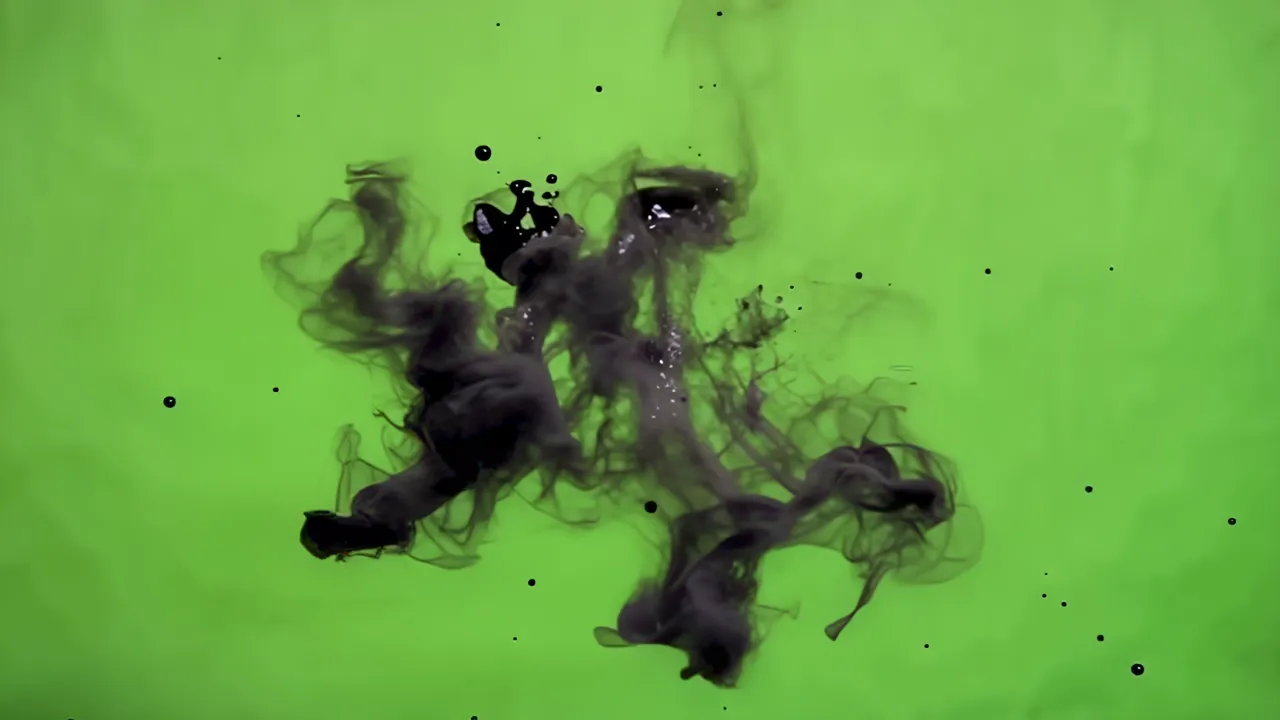 Black Ink Splash on Green Background