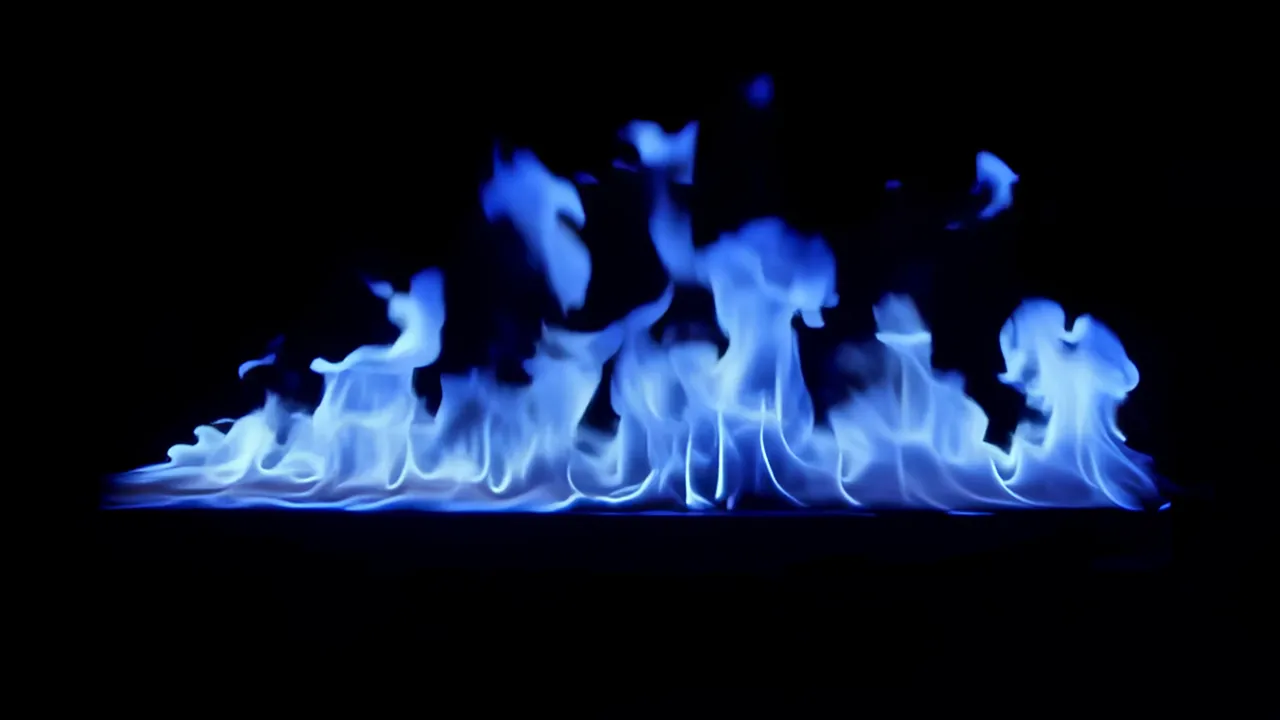 Blue Flaming Fire Rolling Across Dark Background