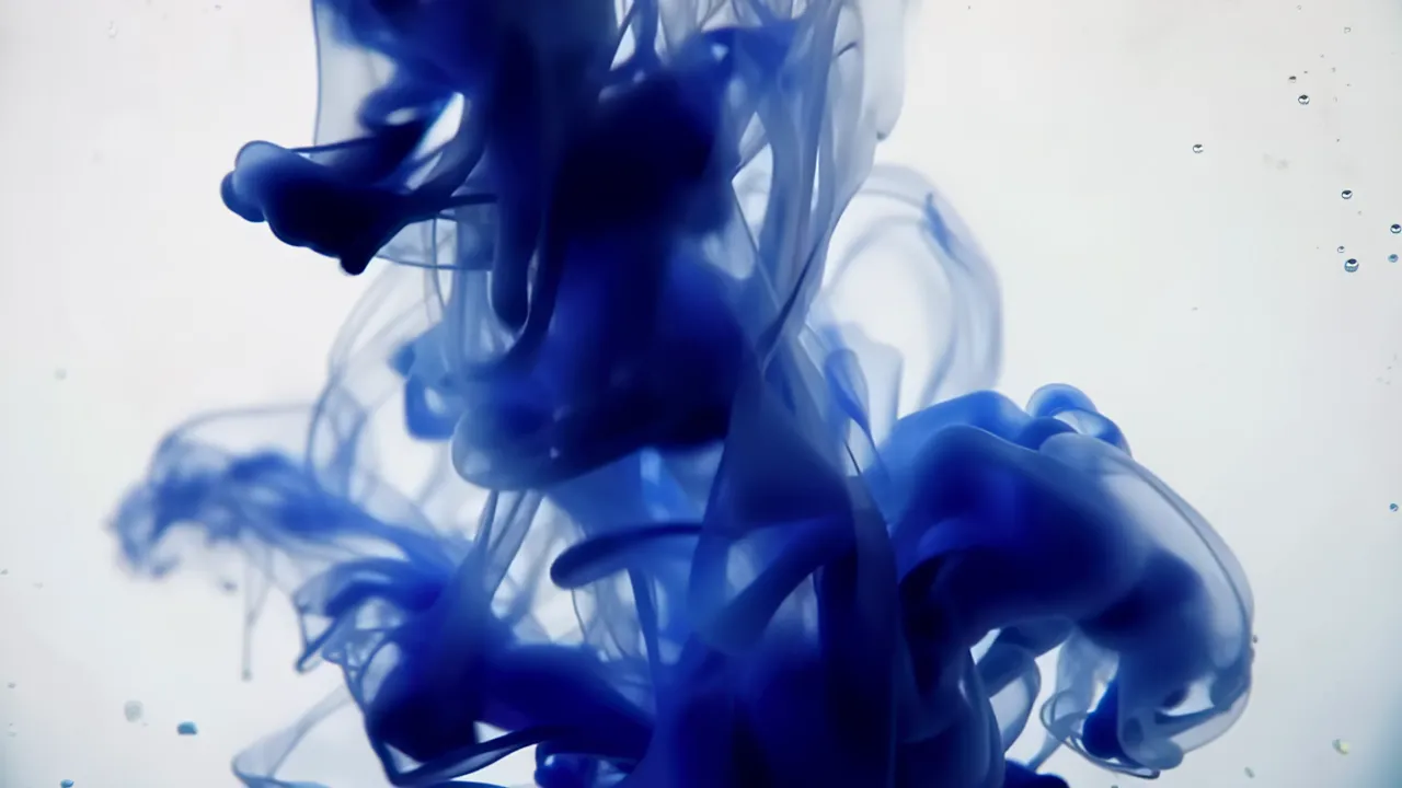 Blue Paint Dissolving in Water, Revealing Layers Below