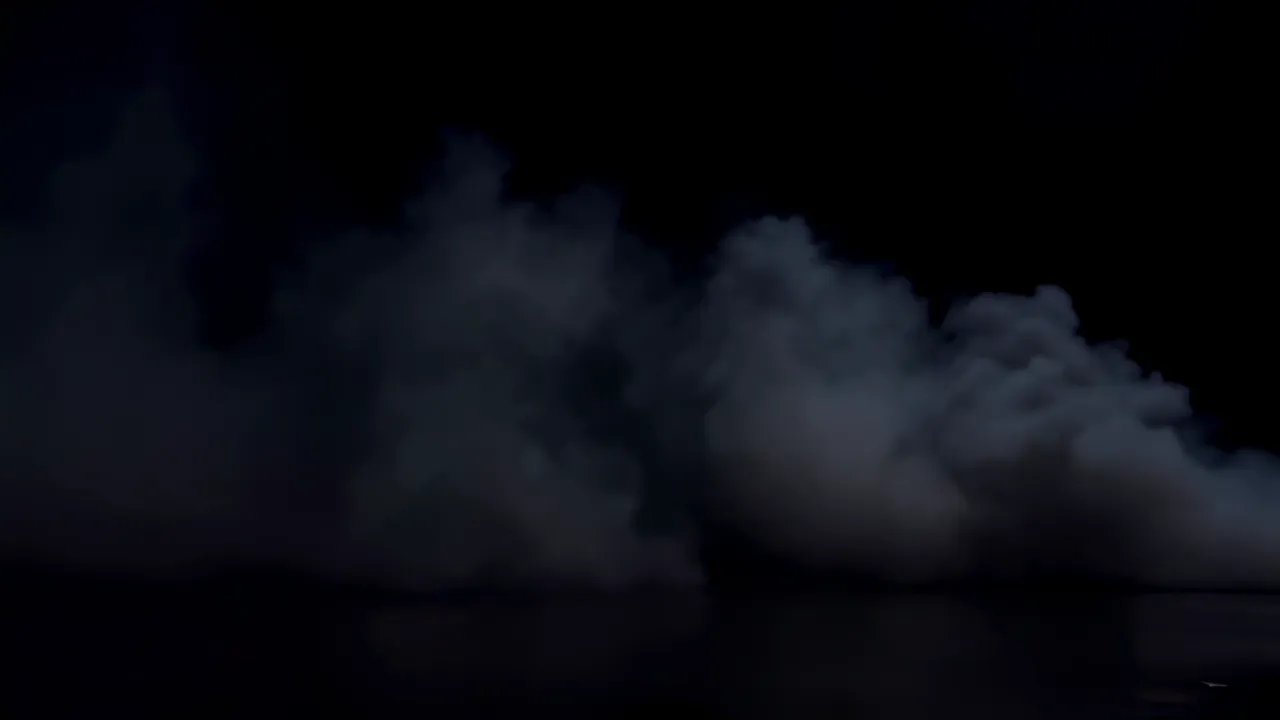 Broad Fog Bank Drifting Against Black Background
