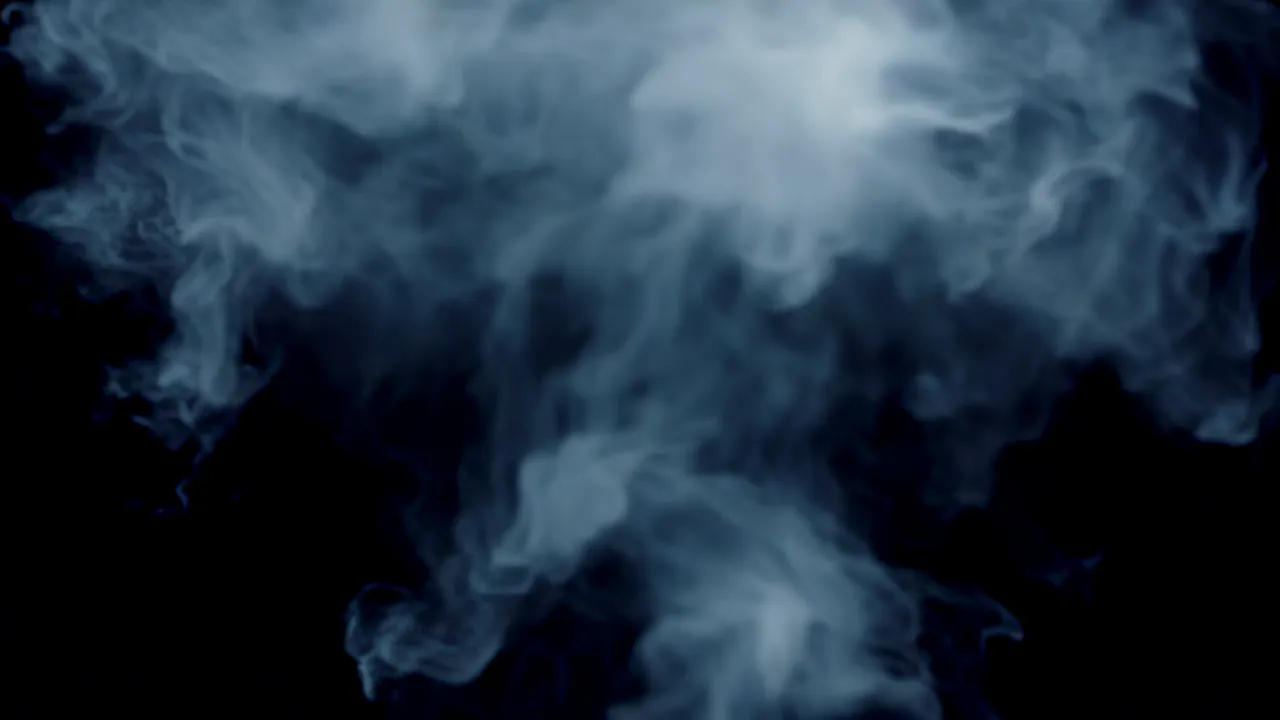 Burst of White Steam Expanding Against Black Background