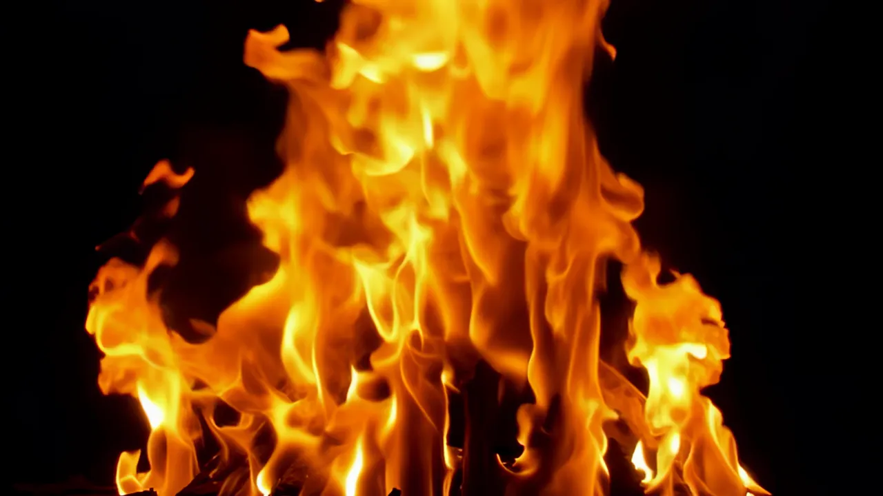 Cascading Fire Flowing Downward with Black Background