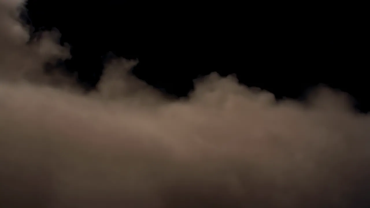 Dense Ground Fog Rolling Across a Dark Landscape