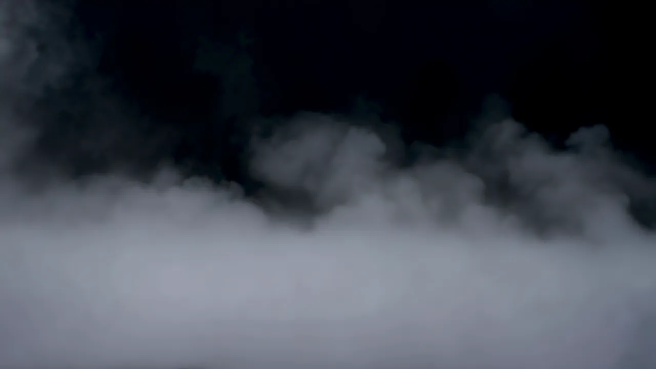 Dense Ground Fog Rolling Across the Frame