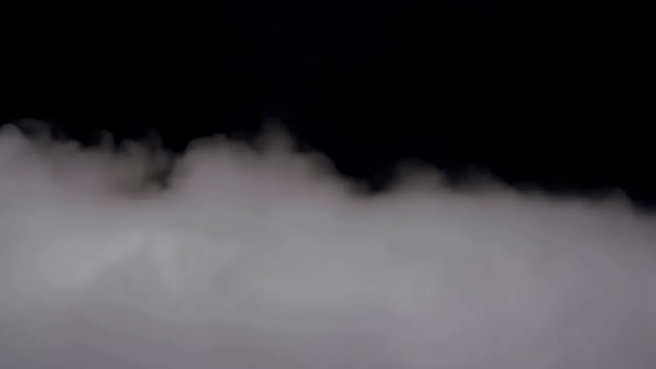 Dense Ground Fog Rolling Across the Frame