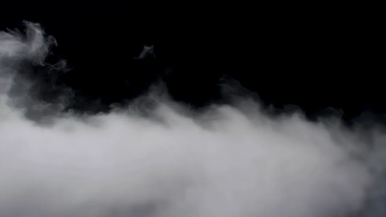 Dense Ground Fog Rolling Across the Frame