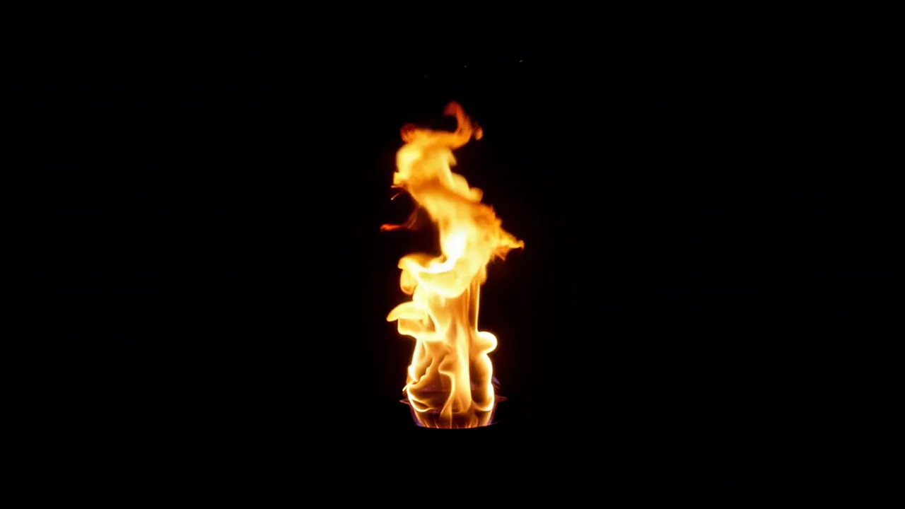 Dramatic Fire Explosion with Steady Burn on Black Background