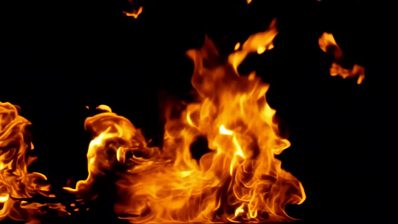 Dynamic Fire Tendrils Reaching Across Frame