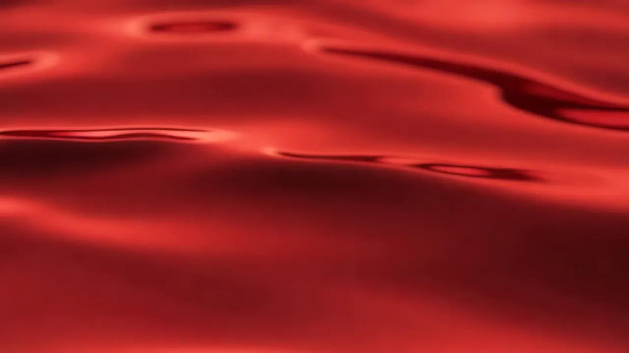 Elegant Red Shimmering Surface with Wave Patterns