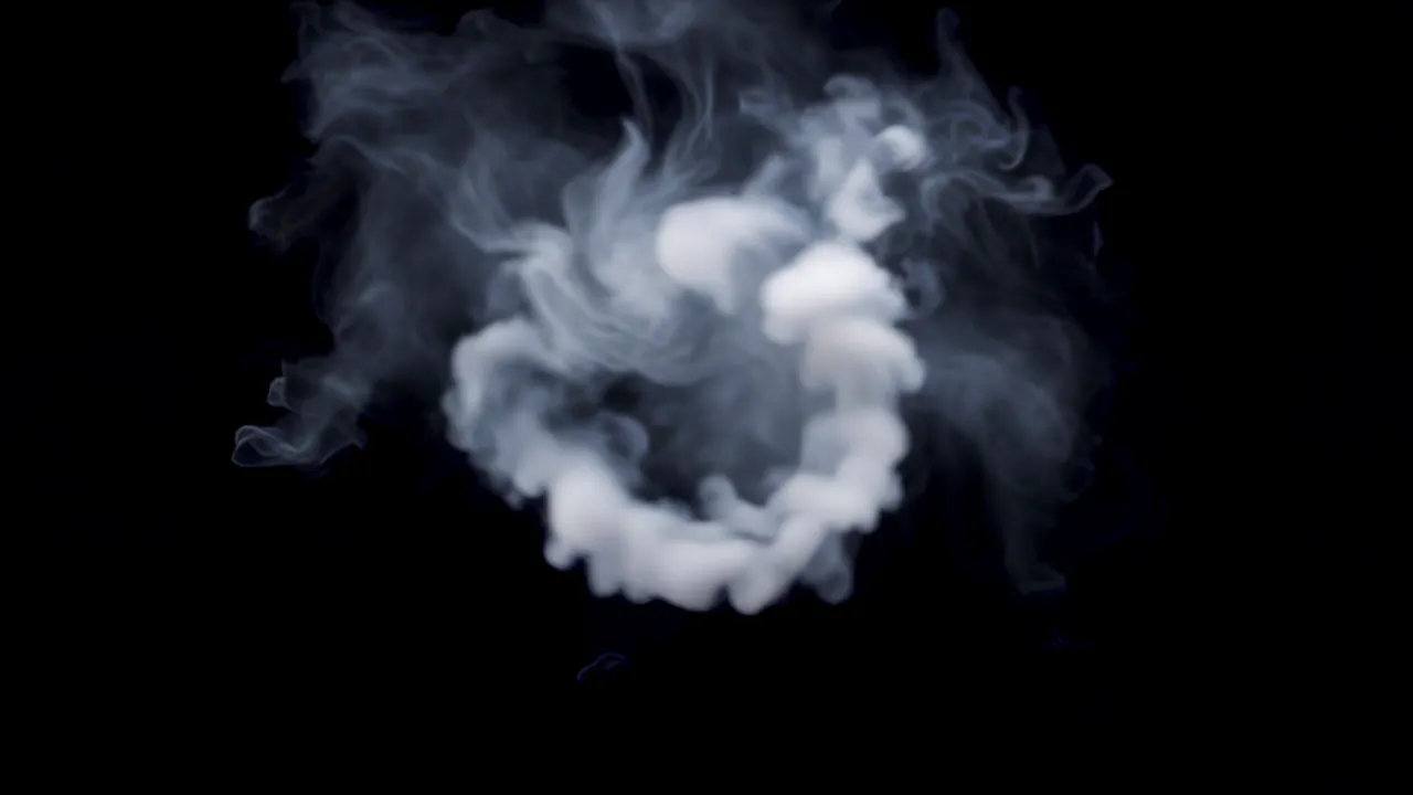 Expanding Smoke Ring Dissolving on Black Background