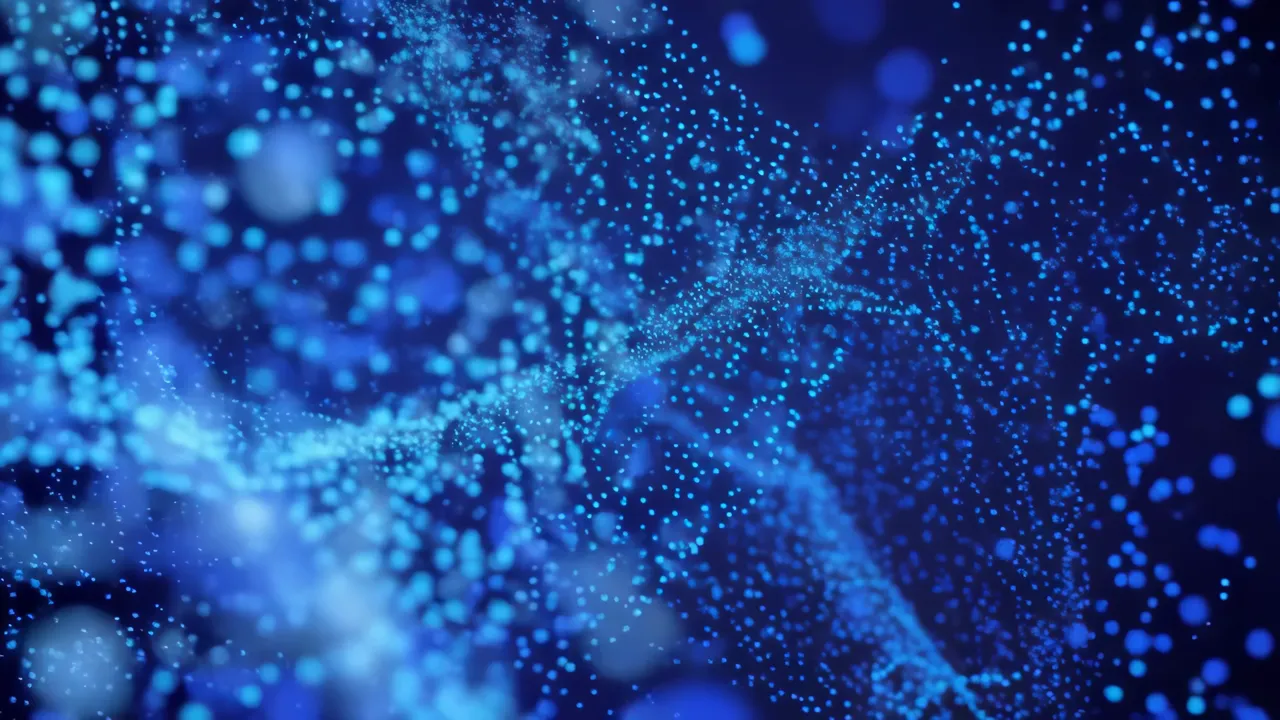 Flowing Blue Particles Against a Dark Background