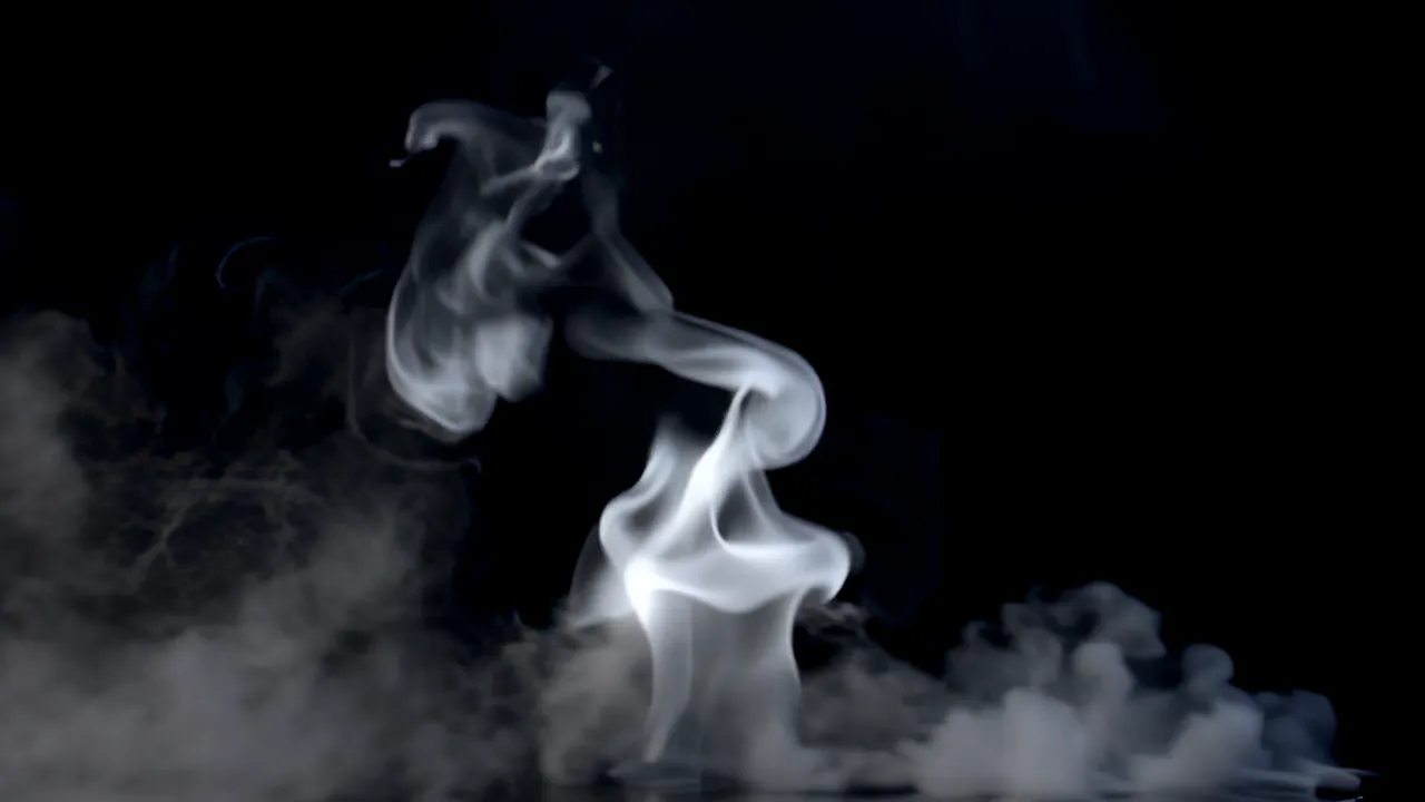 Heavy Low-Lying Smoke Layer Drifting Across Black Background