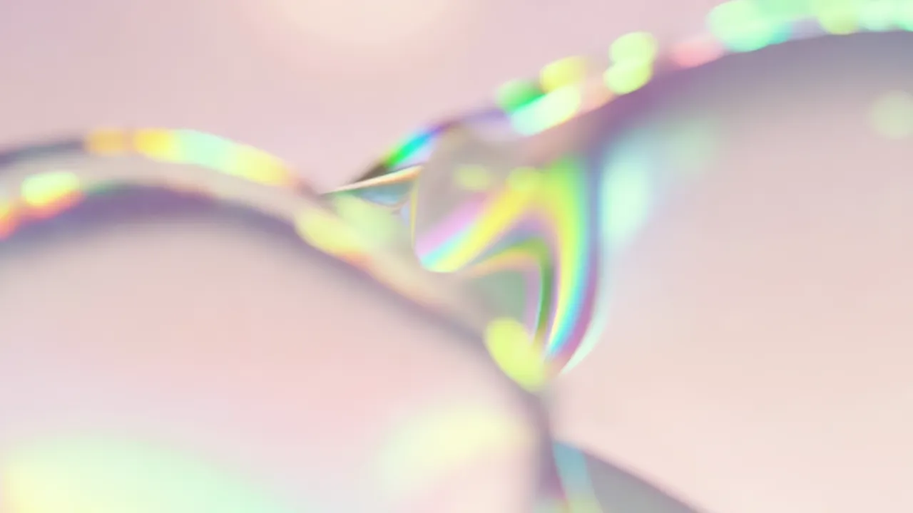 Iridescent Forms Flowing Through a Pastel Atmosphere