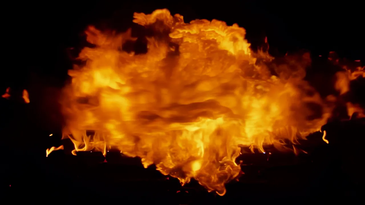 Large Fire Burst Expanding Rapidly in Darkness