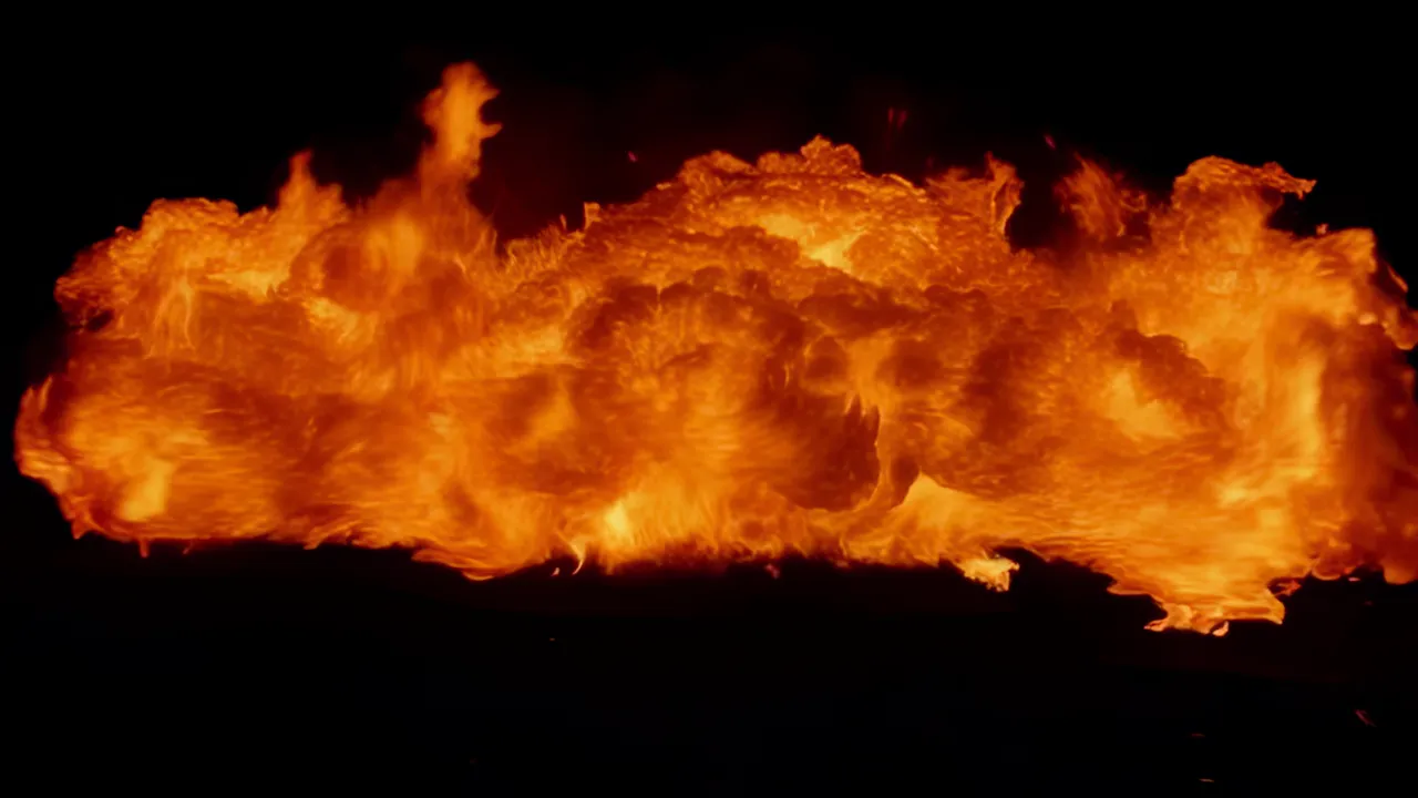 Large Wall of Flames Spreading Across the Frame