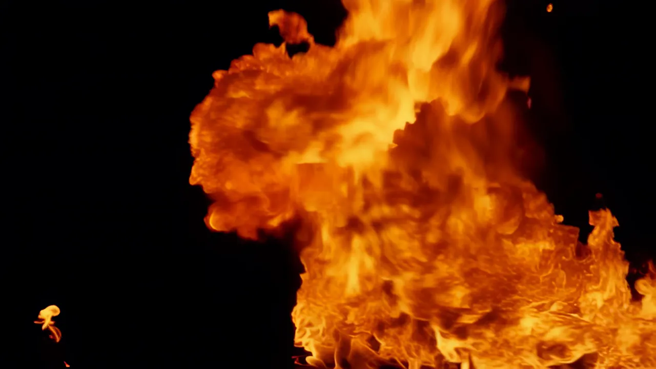 Roiling Fire Mass Spreading Across the Frame