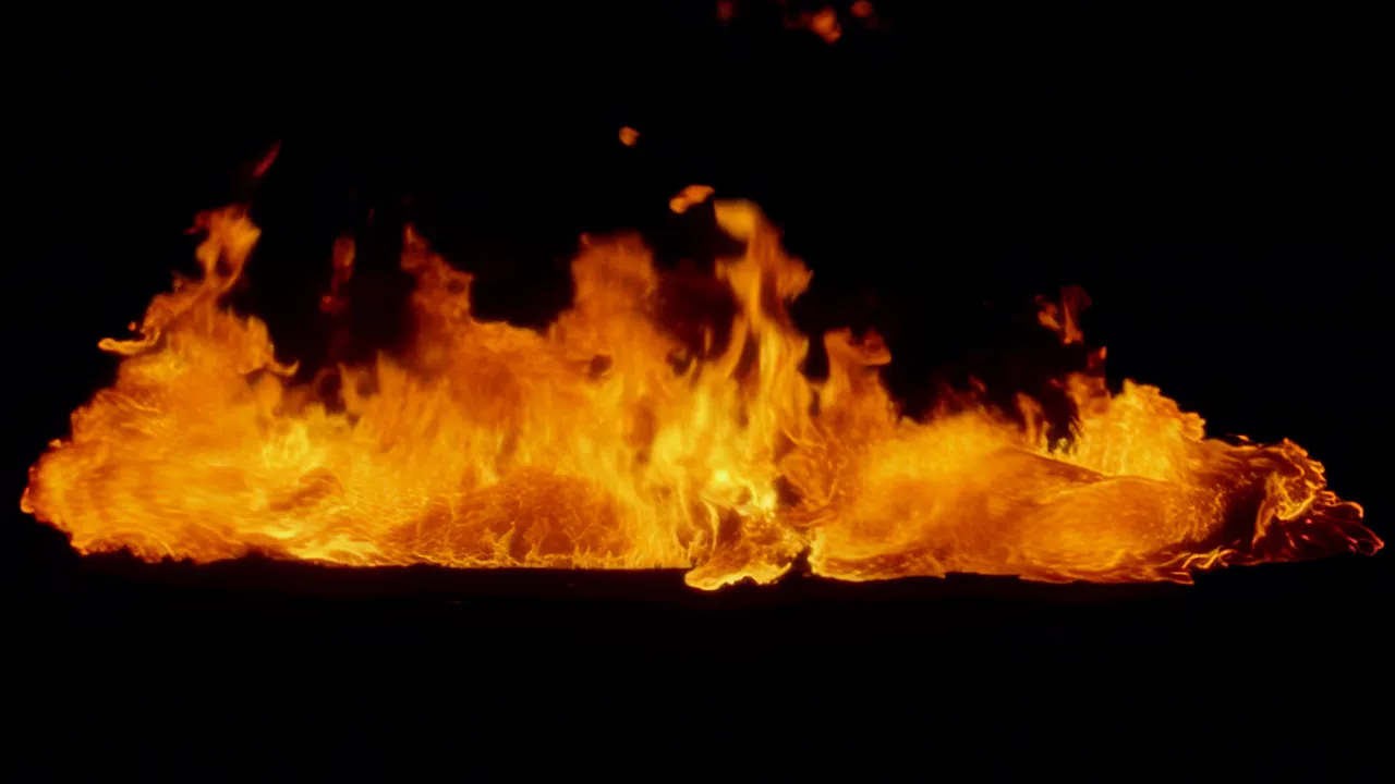Rolling Band of Fire Against Black Background