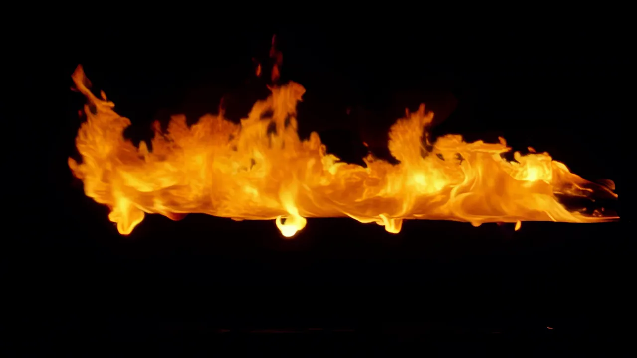 Rolling Orange Fire Wave Against Black Background