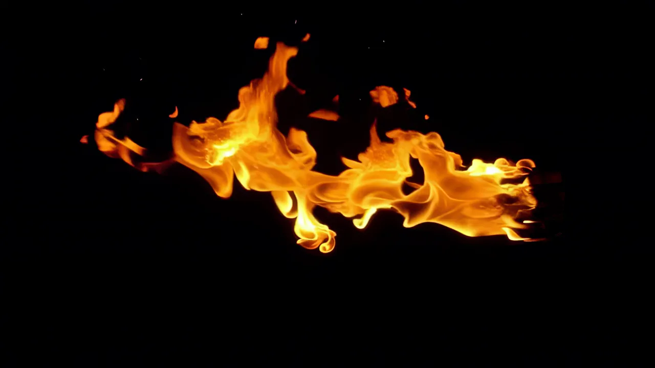 Rolling Wave of Orange Fire on Black Background