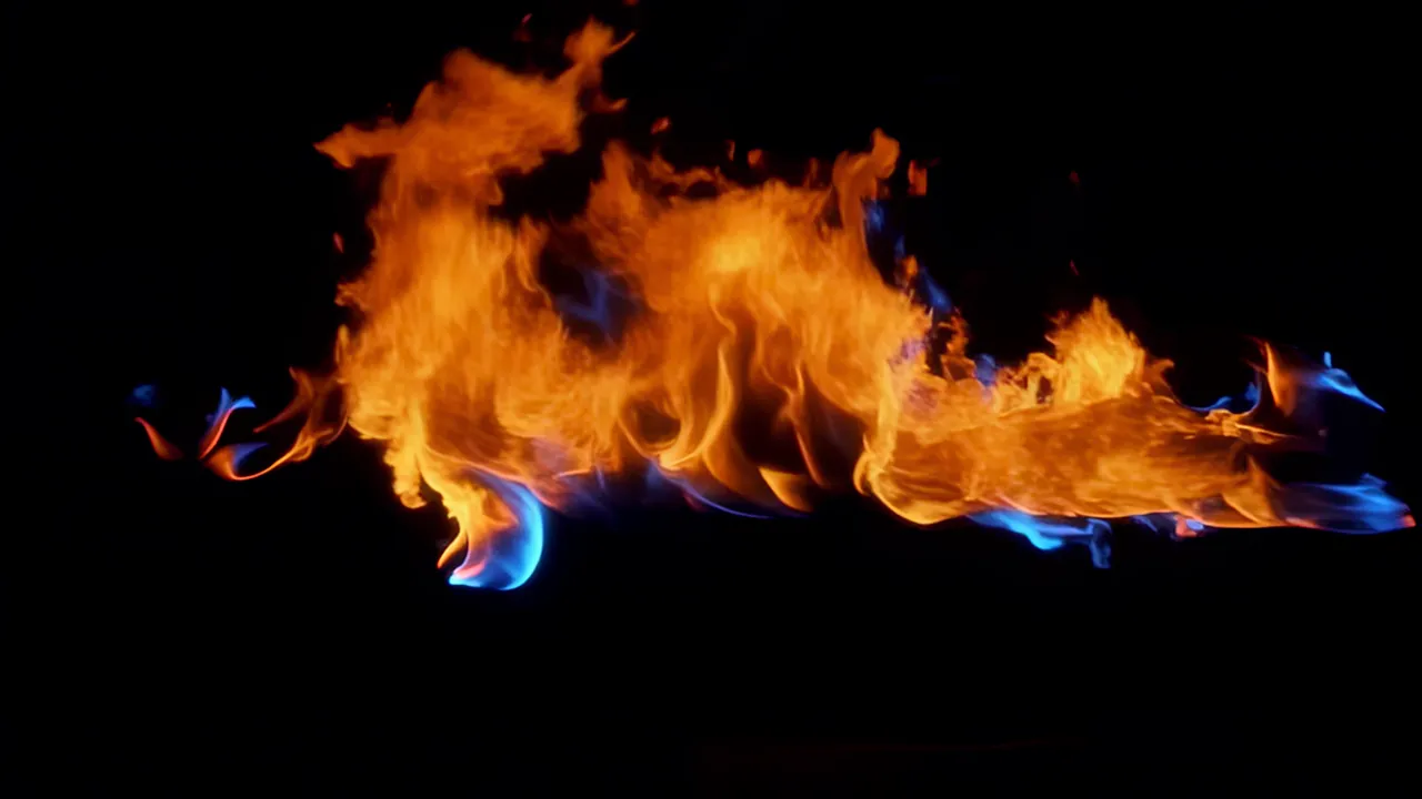 Rolling Wave of Orange Fire on Black Background