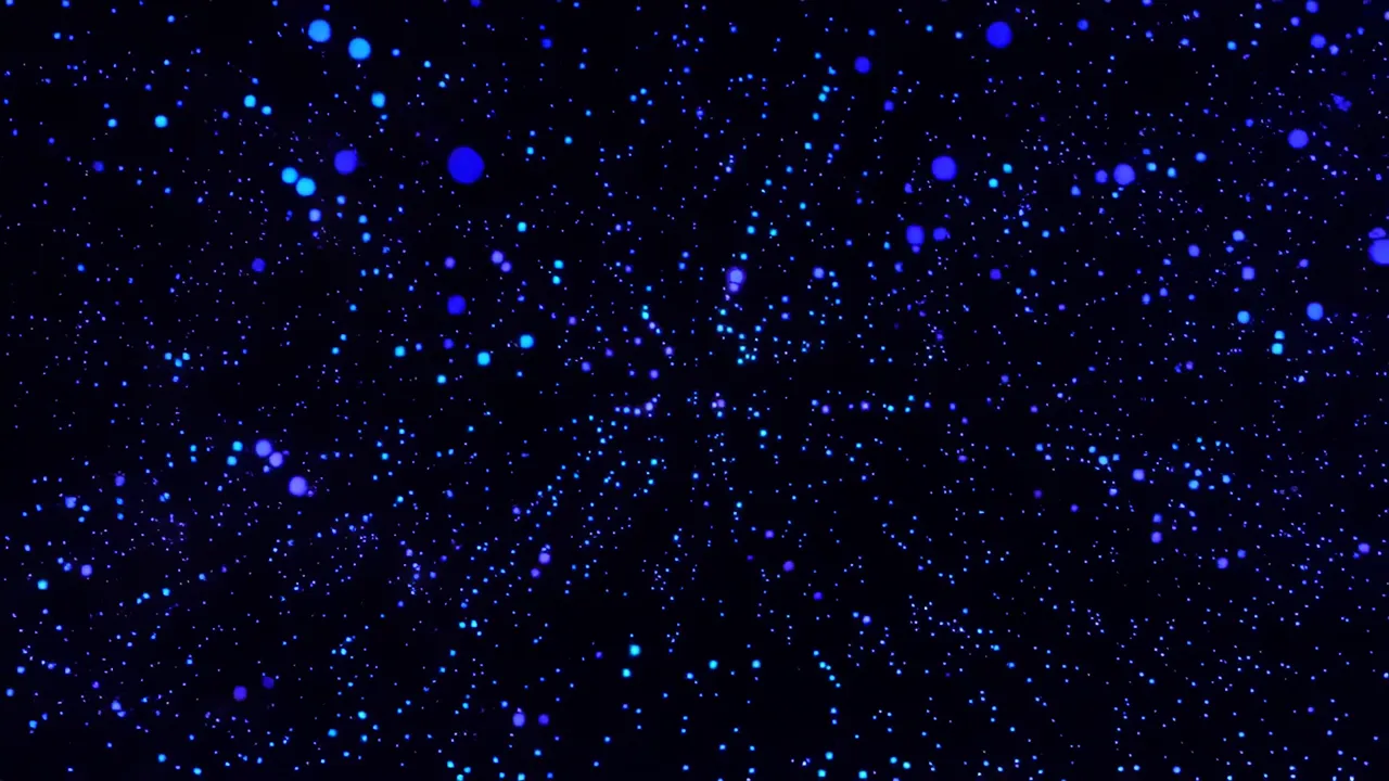 Scattered Blue Light Particles in Black Background