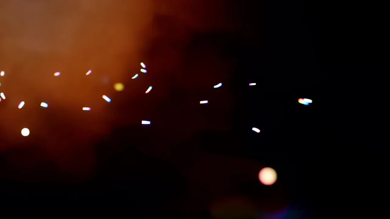 Scattered Rainbow Light Fragments on Black Background
