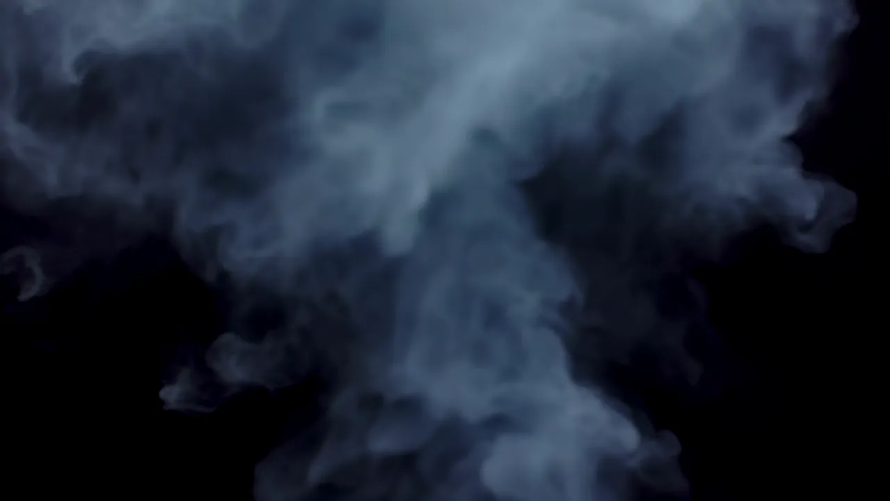 Soft Atmospheric Haze of Pale Smoke on Black Background