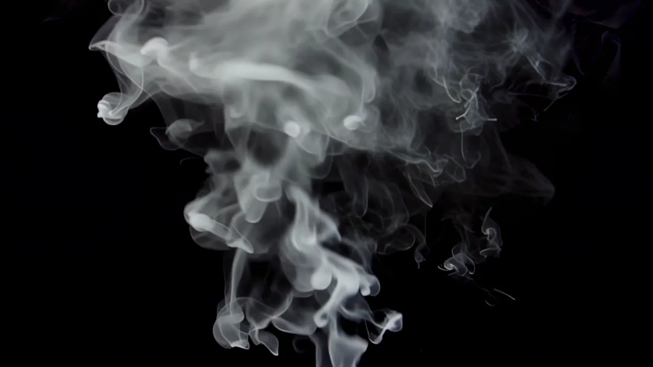 Soft Atmospheric Haze of Pale Smoke on Black Background