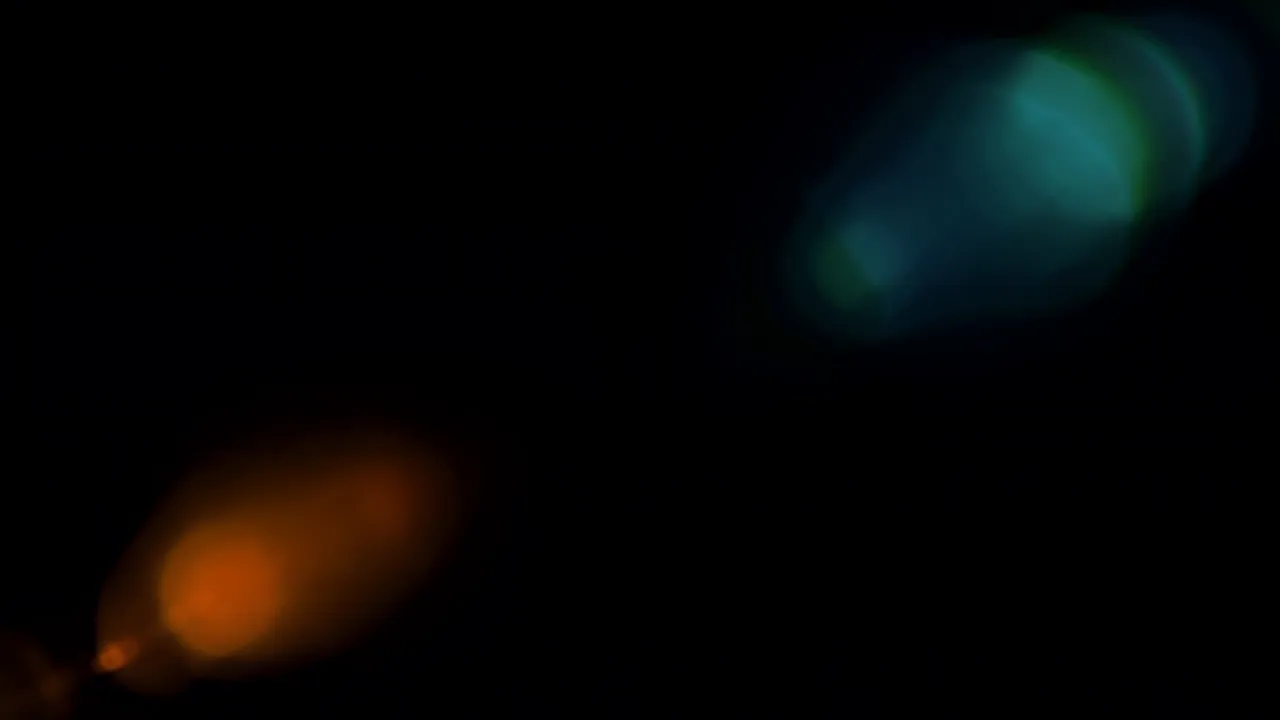 Soft Cool Blue Light Leak on Black Background