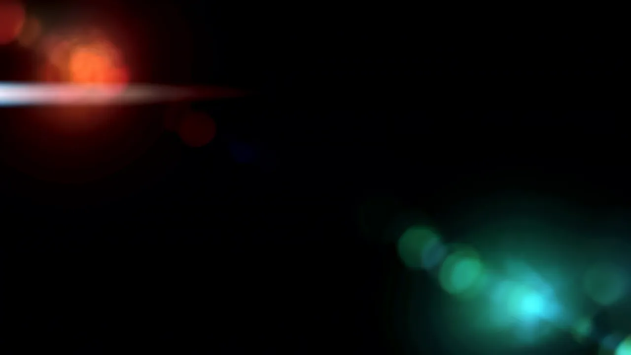 Soft Red and Orange Light Bloom on Black Background