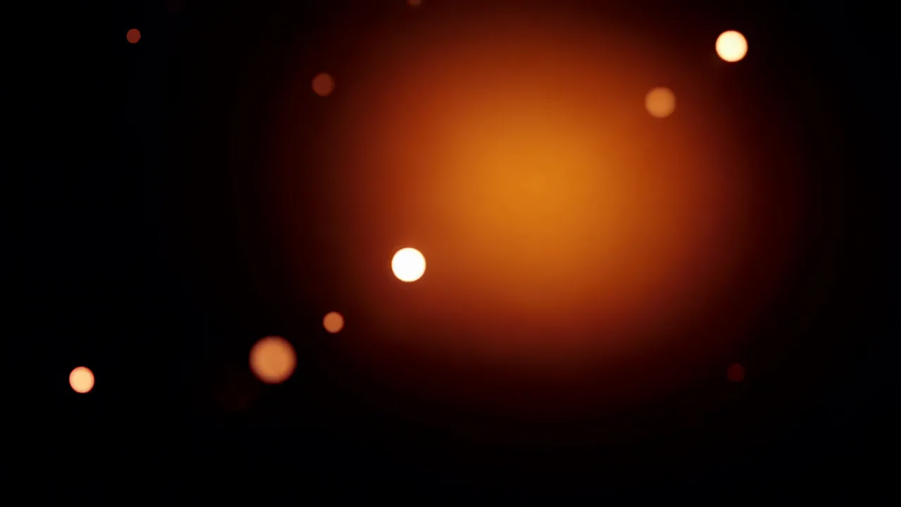 Soft Red and Orange Light Blooming on Black Background