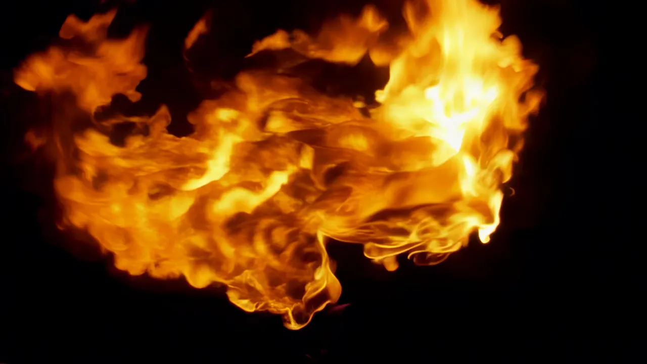 Swirling Fire Vortex on Black Background