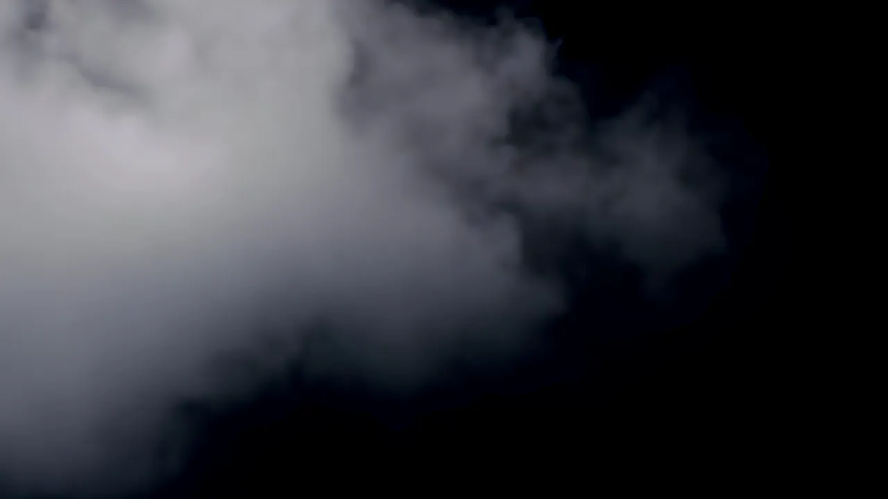 Thick Fog Bank Drifting Slowly Across Black Background