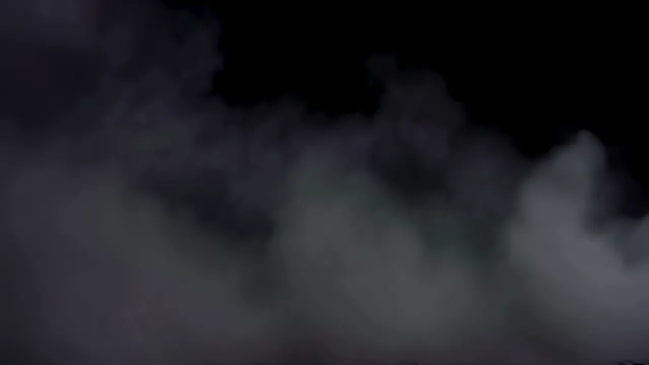 Thick Smoke Rolling Along Ground Level