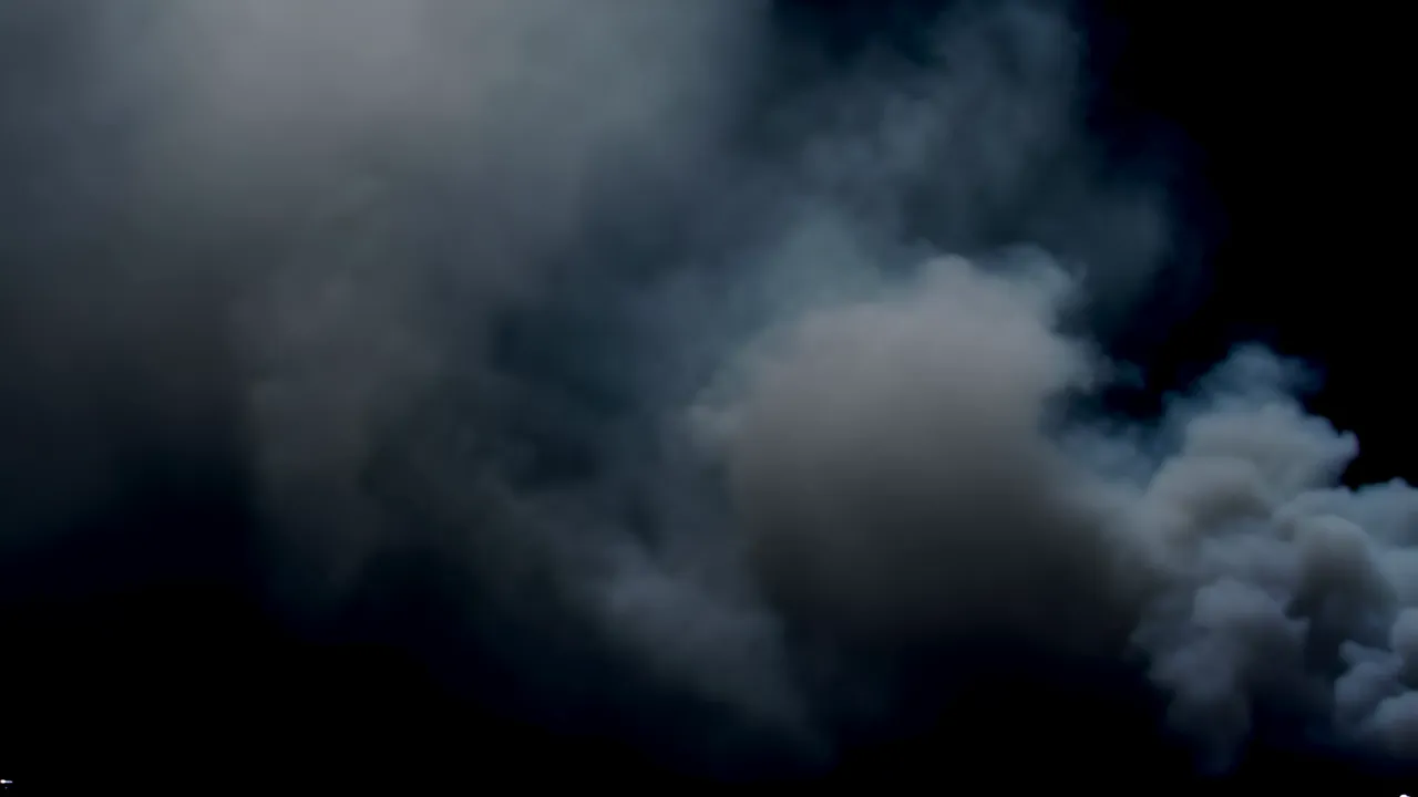 Thick Smoke Rolling Along the Ground Level