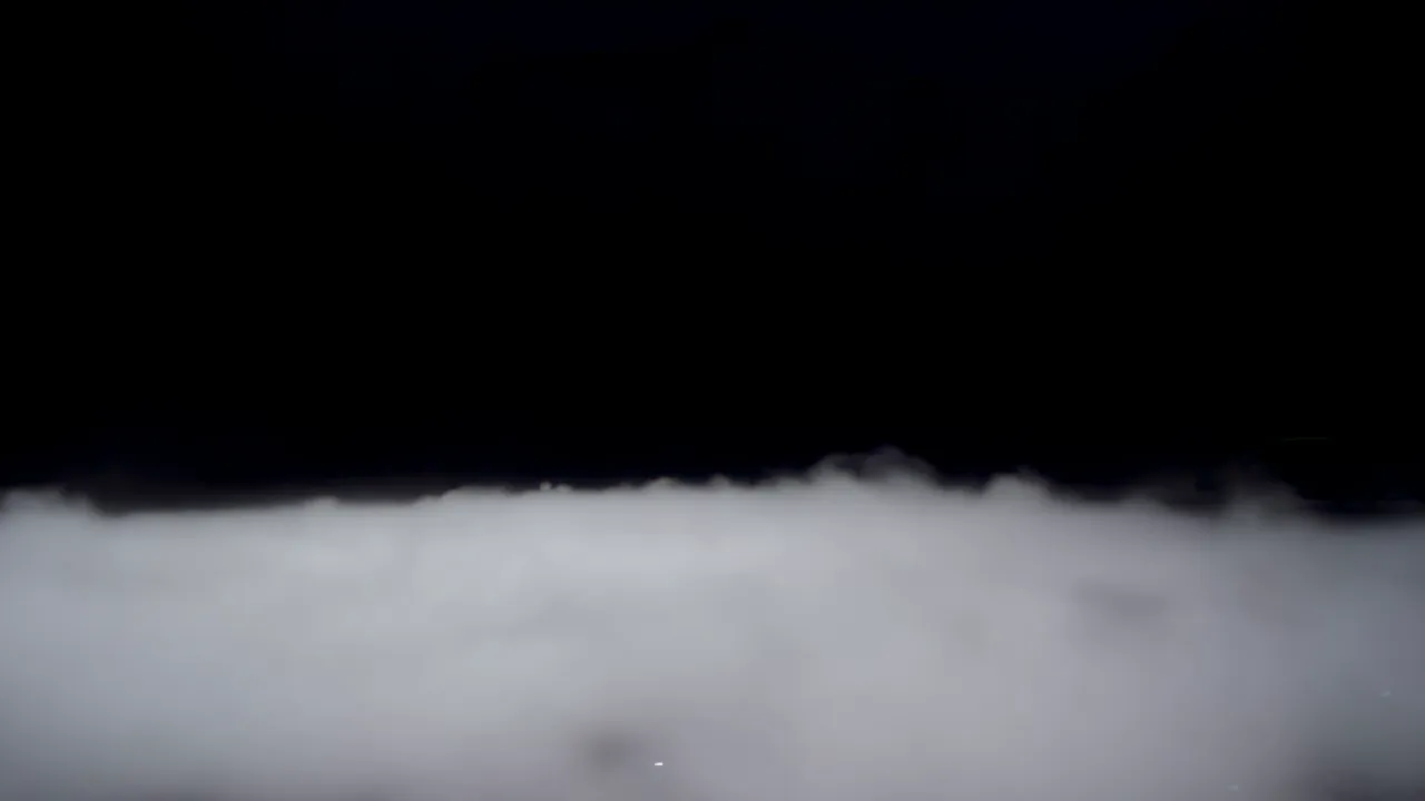Thick Smoke Rolling Along the Ground Level