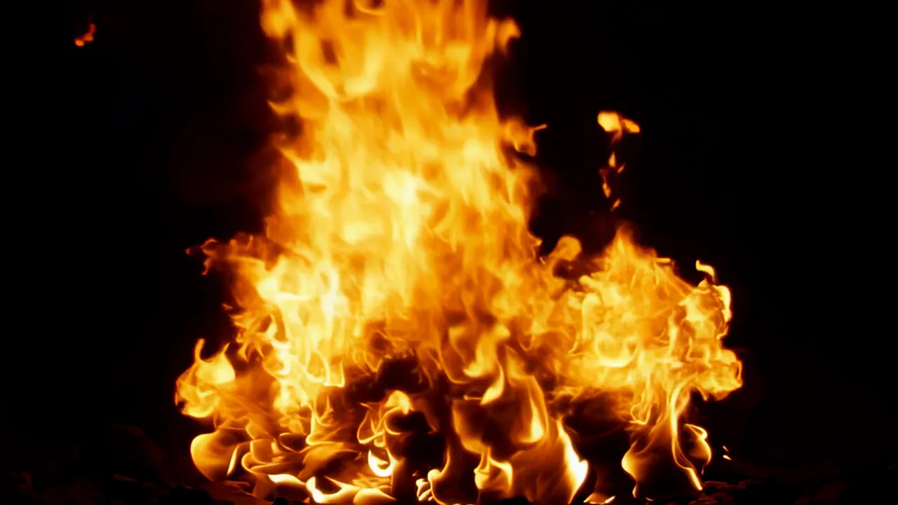 Vibrant Flames Erupting and Churning in Darkness