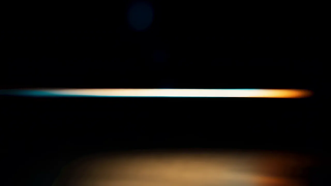 Warm Amber Light Bleeding on Pure Black Background