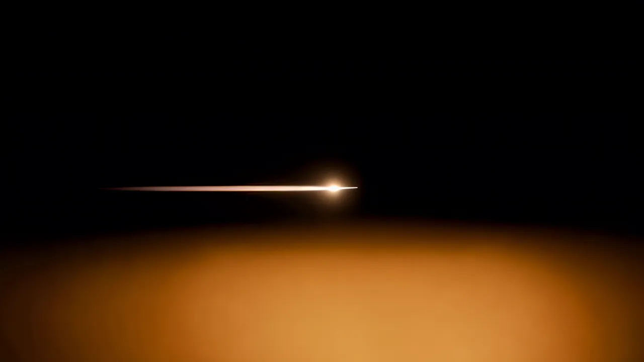 Warm Amber Light Over Black Background
