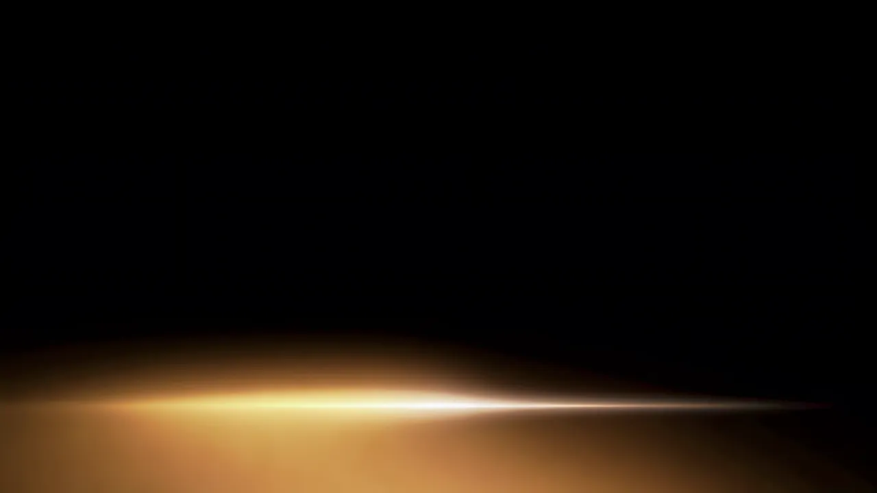 Warm Amber Light Wash on Black Background