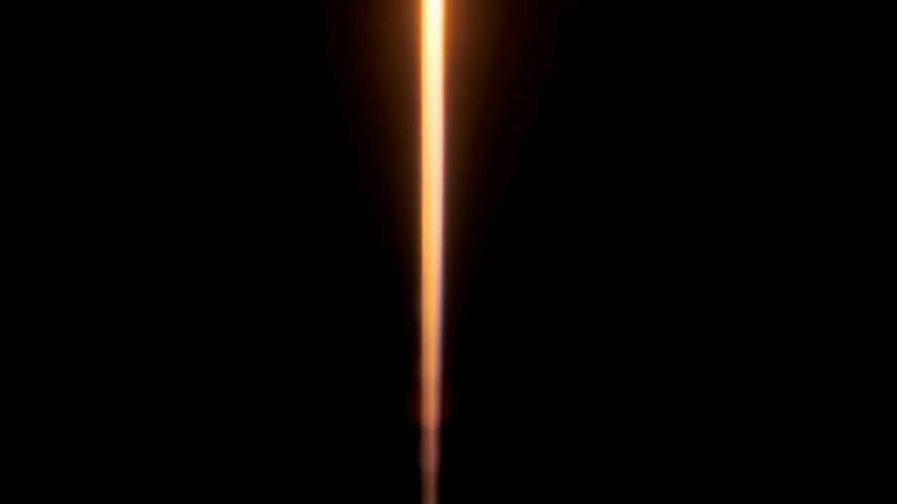 Warm Golden Light Streak on Black Background
