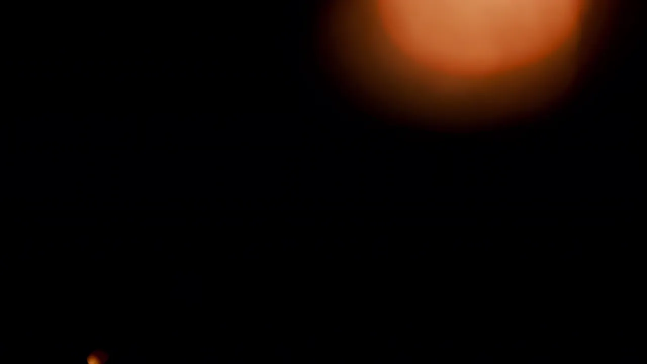 Warm Light Leaks on Black Background