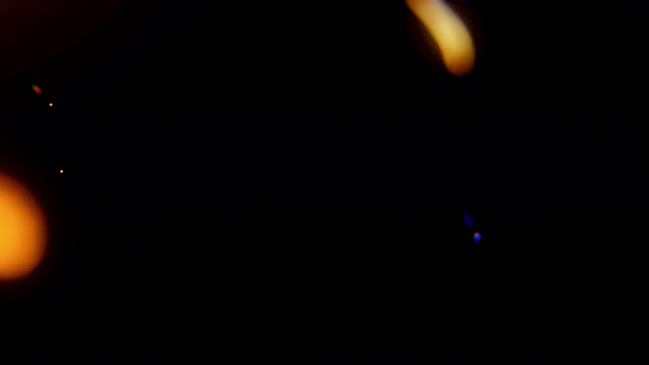 Warm Orange Light Bloom on Black Background