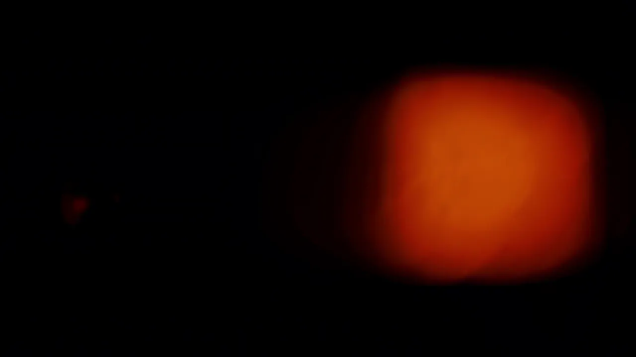 Warm Orange Light Blooming on Black Background