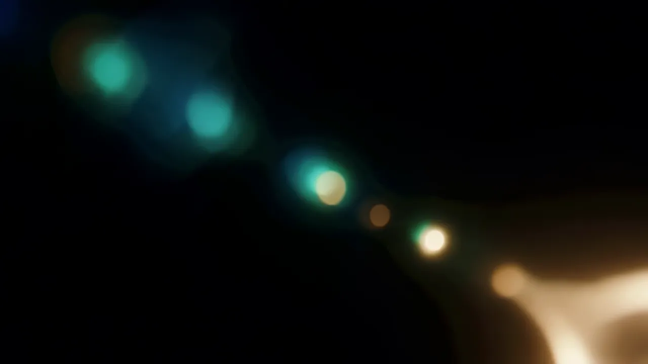Warm Organic Light Leaks Pulsing on Black Background