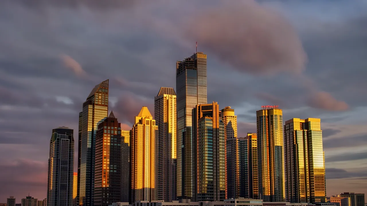 Wide Angle View of Dense Skyscraper Cluster Against Blue Sky