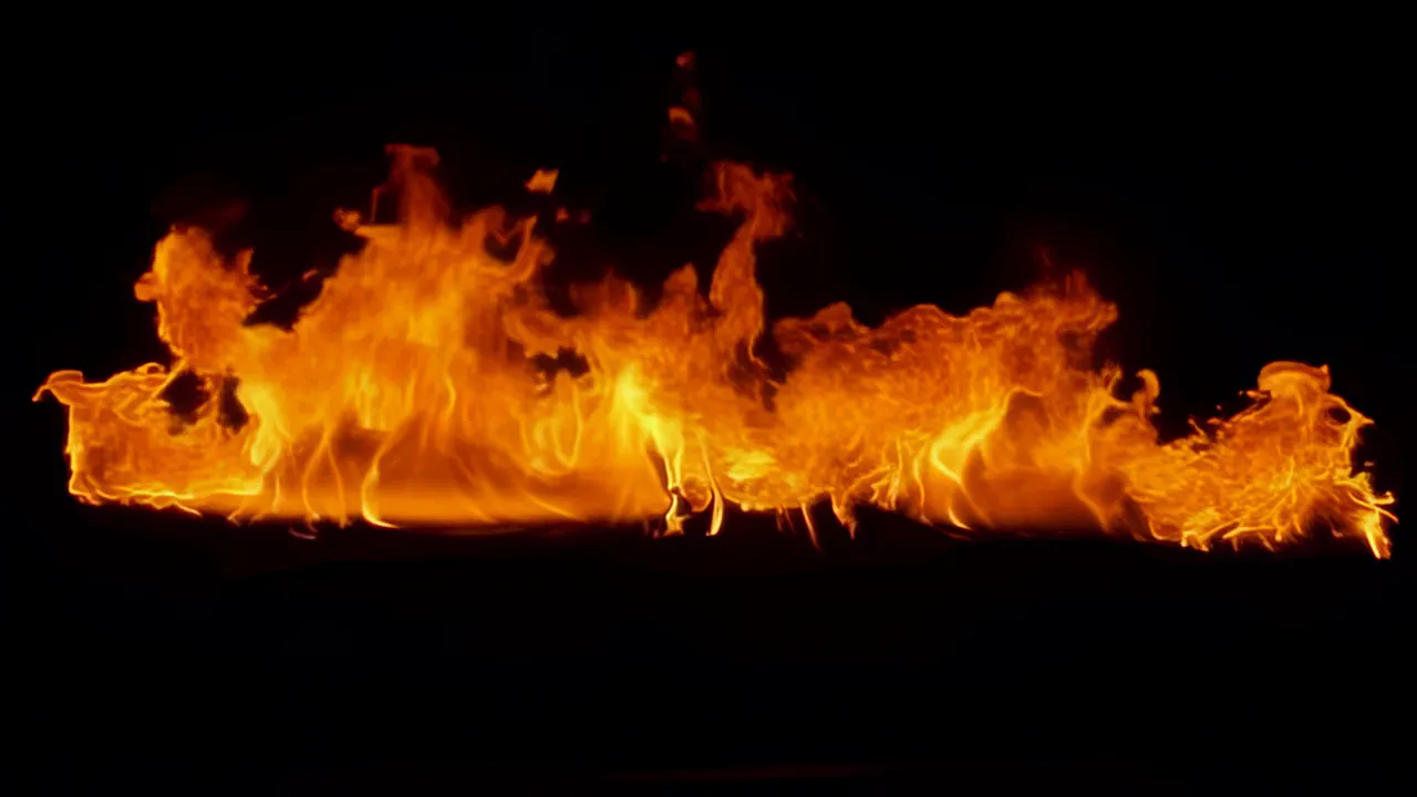Wide Explosion of Fire Spreading Across the Frame
