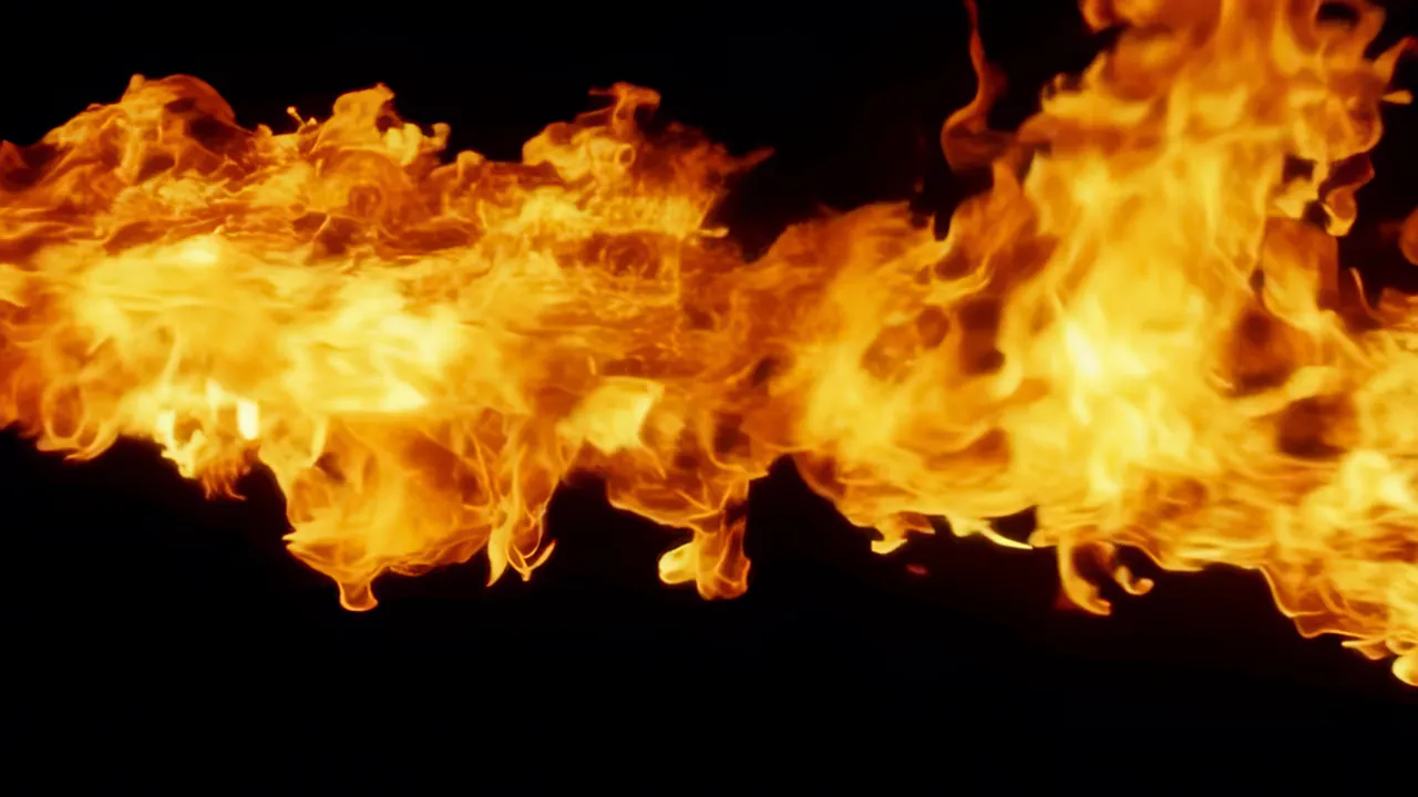 Wide Explosion of Fire Spreading Across the Frame