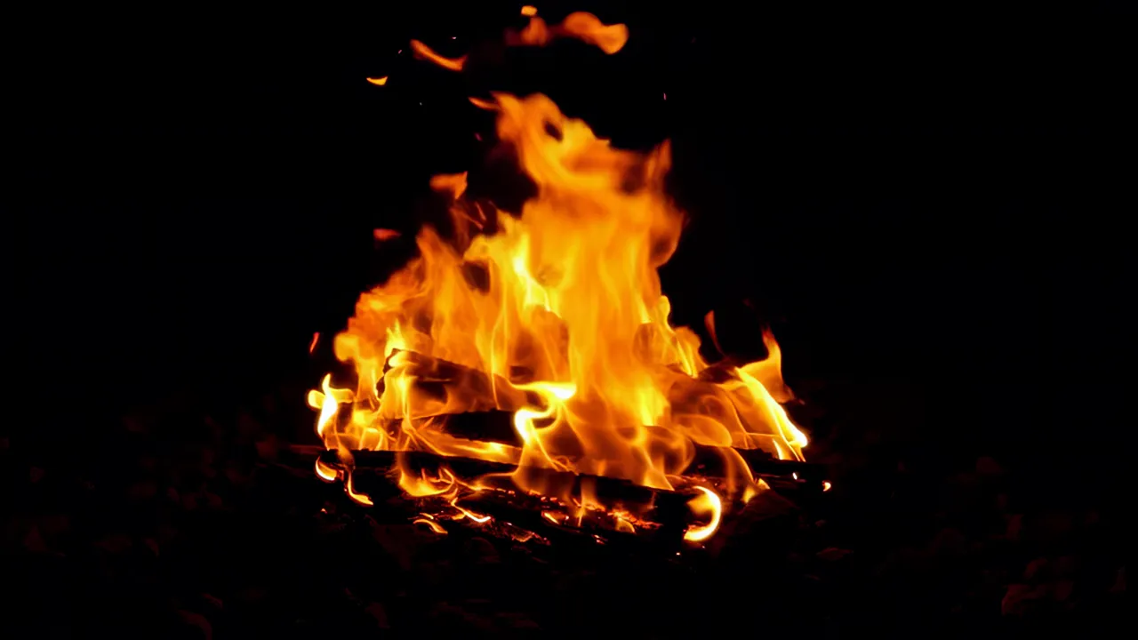 Wide Fire Explosion Spreading Across Dark Background